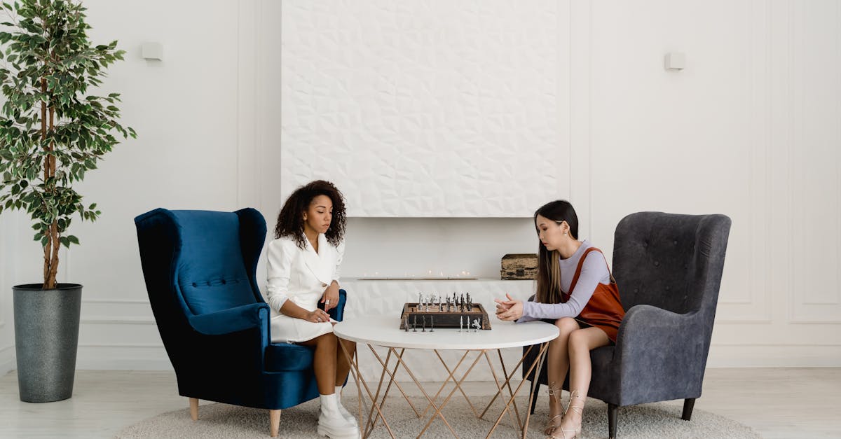 Child learning chess with guide