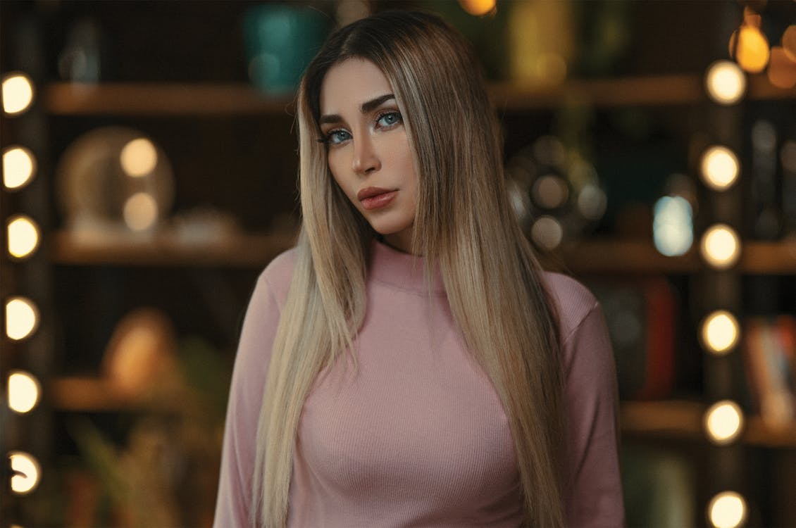 A Woman in Purple Long Sleeve Shirt