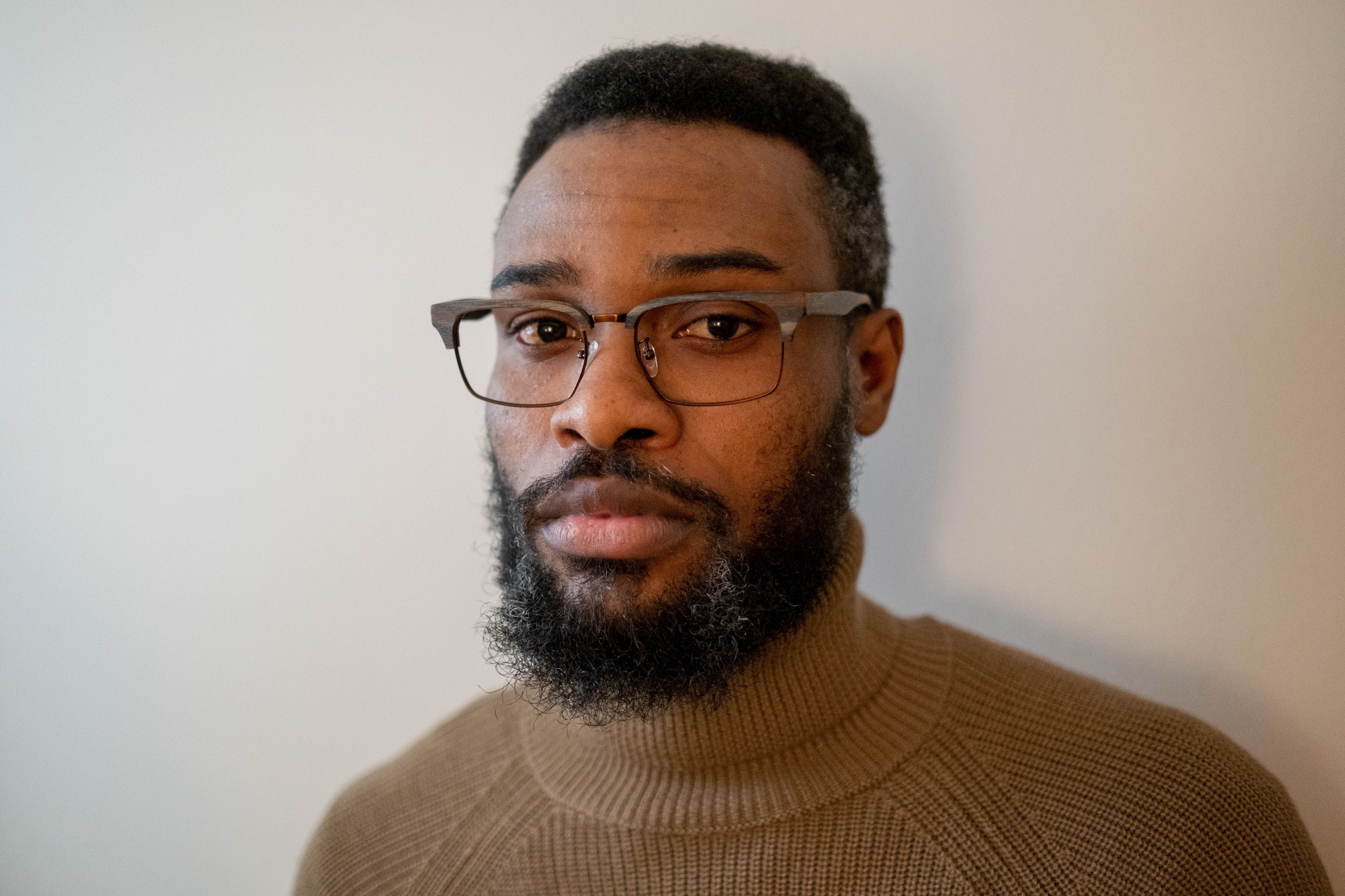 A Man in Brown Turtleneck Shirt · Free Stock Photo