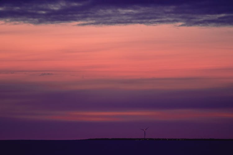 Pink And Purple Sky Over A Sea 