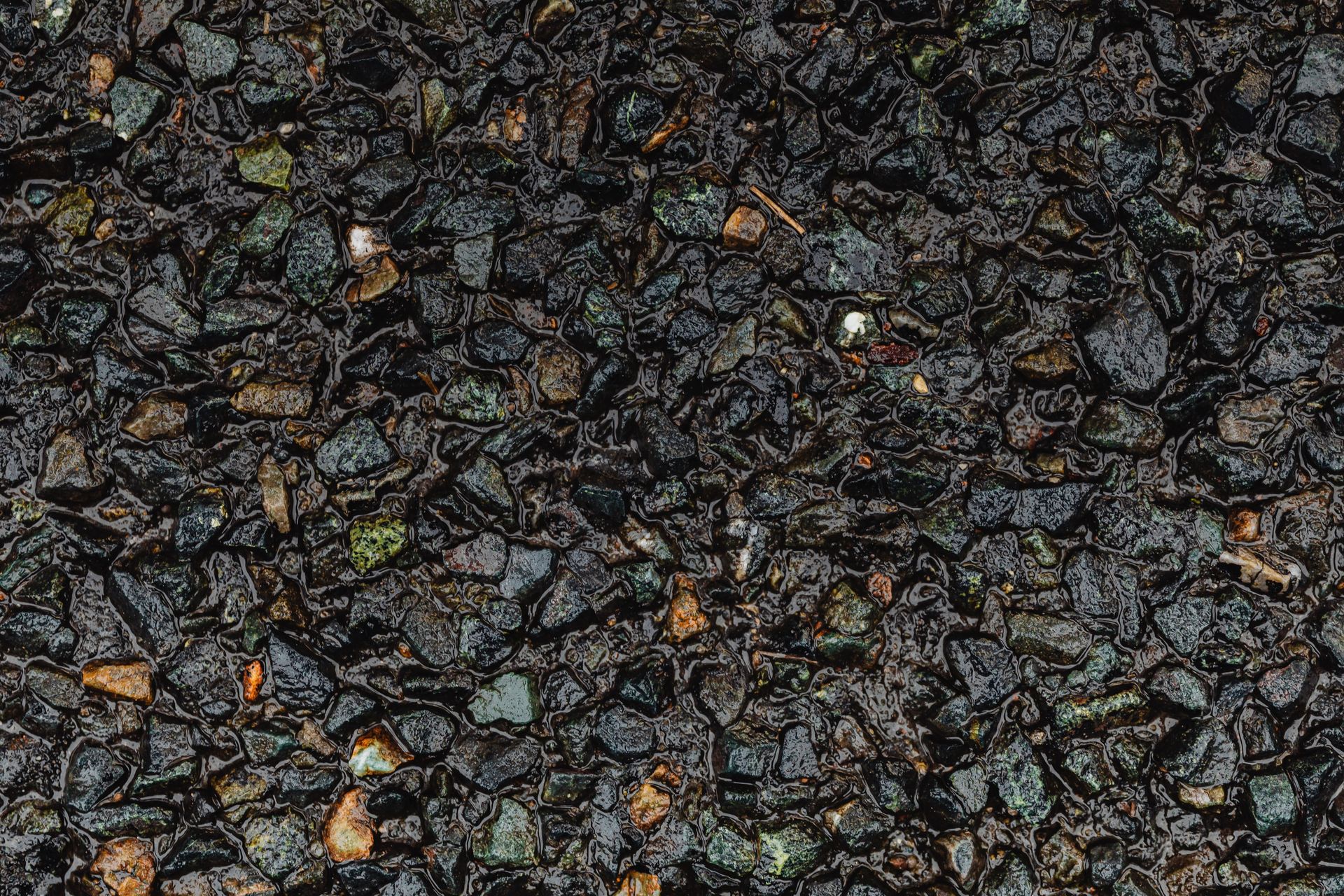 Fresh asphalt concrete surface showing aggregate macrotexture