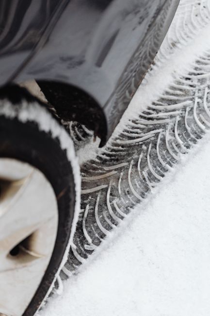 car tire on snow close up