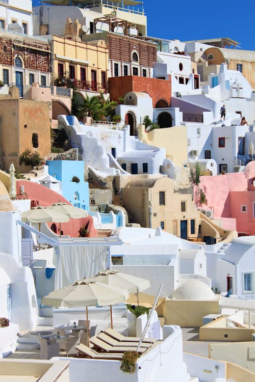 Colorful Houses on a Hill Slope of Oia Village, Santorini, Greece