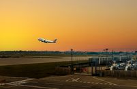 White Airplane on Airport during Sunset