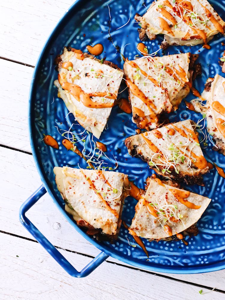 Delicious Tortilla With Vegetables On Blue Plate