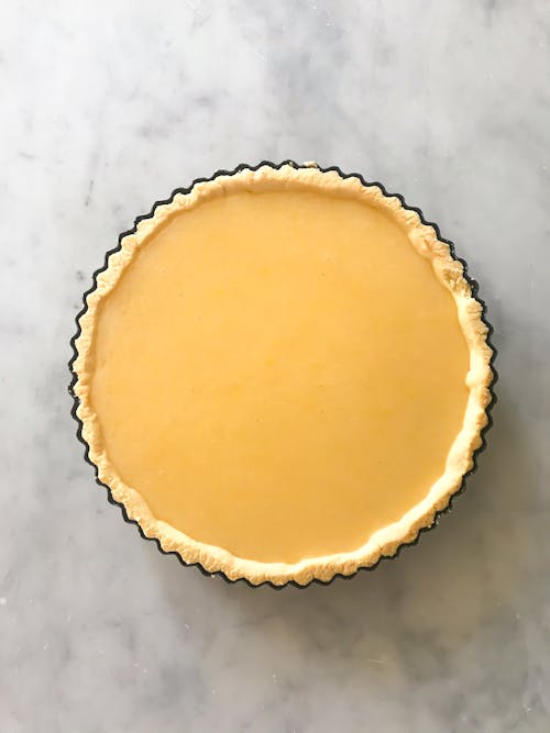 Lemon tart on marble table