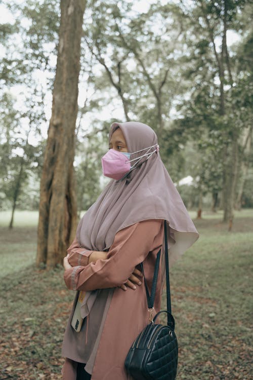 A Woman in Gray Hijab Wearing Facemask