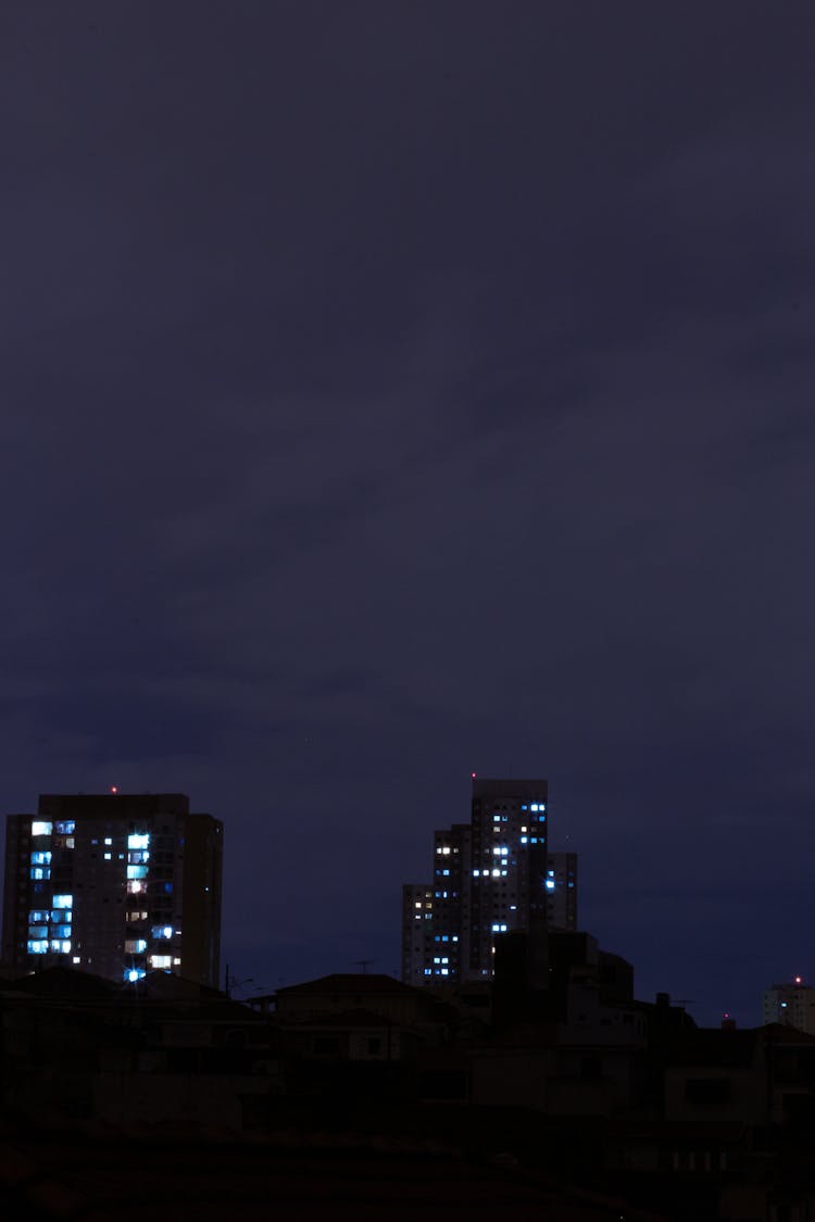 Tall Buildings On Dark Sky