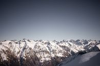 Snow Covered Mountains Under Blue Sky