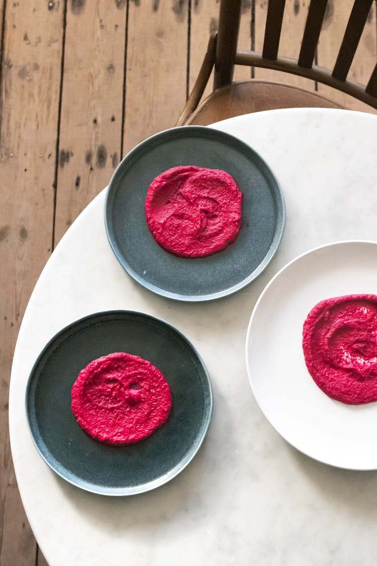 Beetroot Puree On Plates On Table