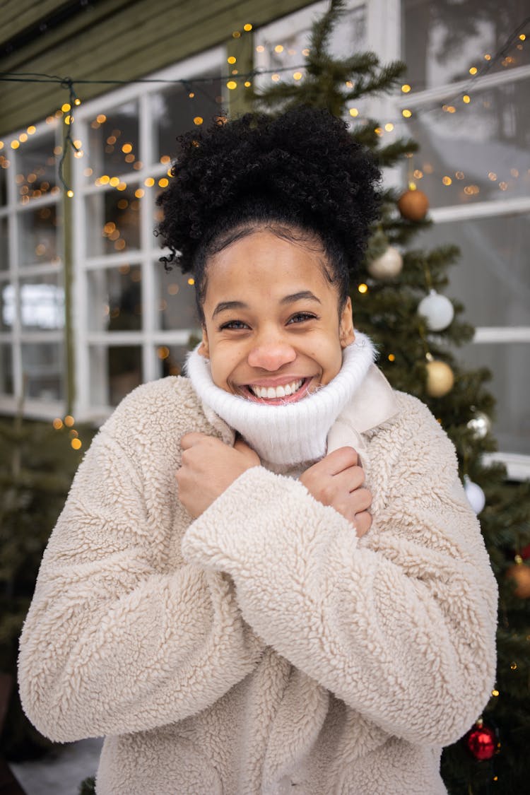 A Woman In Fur Jacket Smiling