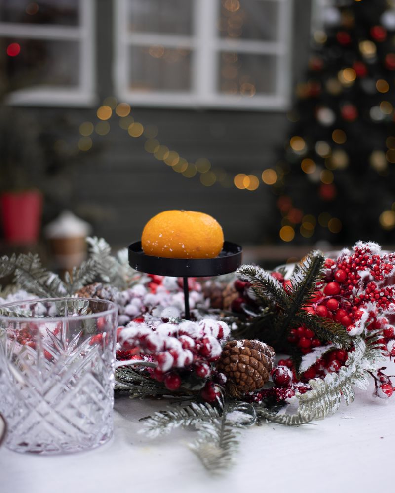Elegant Christmas and New Year event decoration with festive greenery and lights