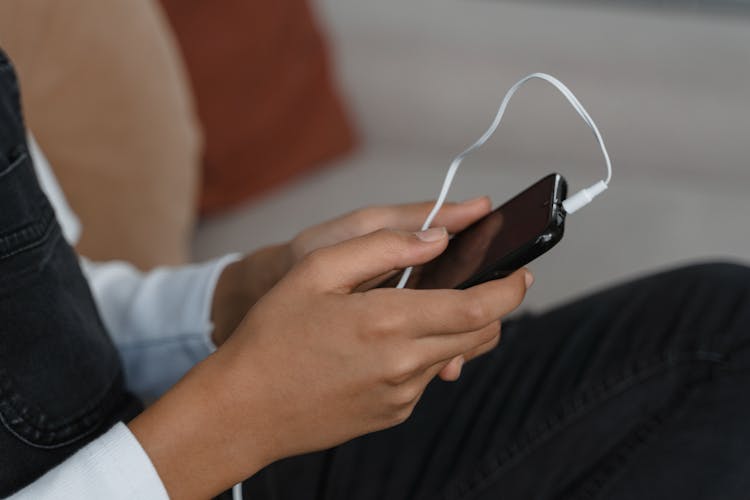 Photo Of Person Holding A Black Phone