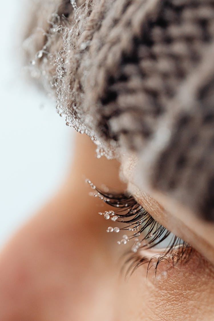 Close Up Of Woman Eye With Frozen Eyelashes