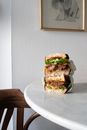 Delicious sub sandwich on table