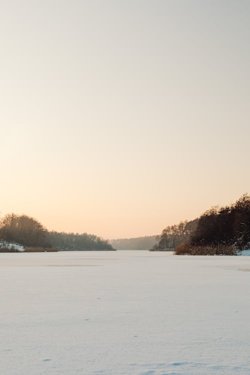 Landscape with Snow on Frozen Lake at Down