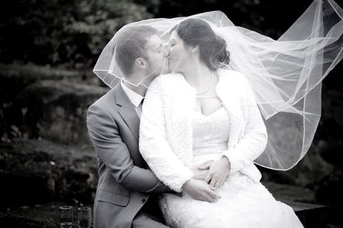Happy Married Couple Kissing 