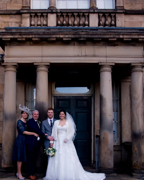 Bride and Groom Posing with Parents