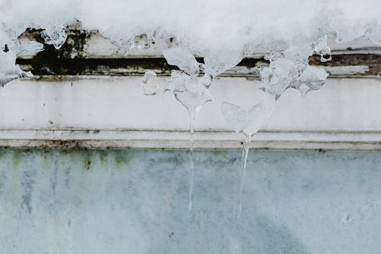 Icicle Hanging From House Window