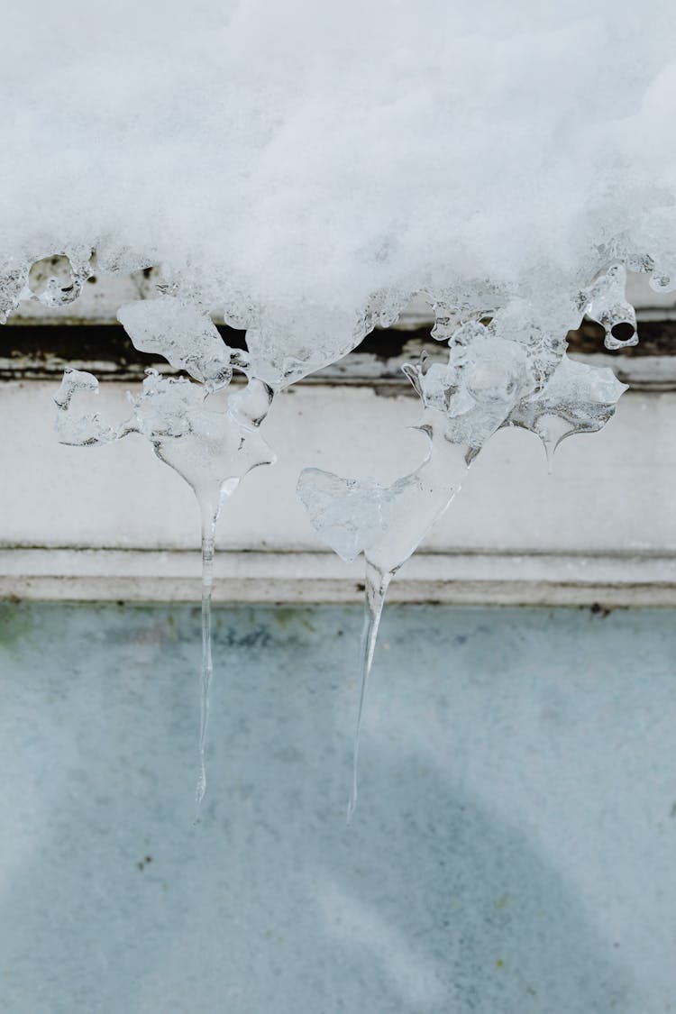 Close-up Of Little Icicles And Snow 