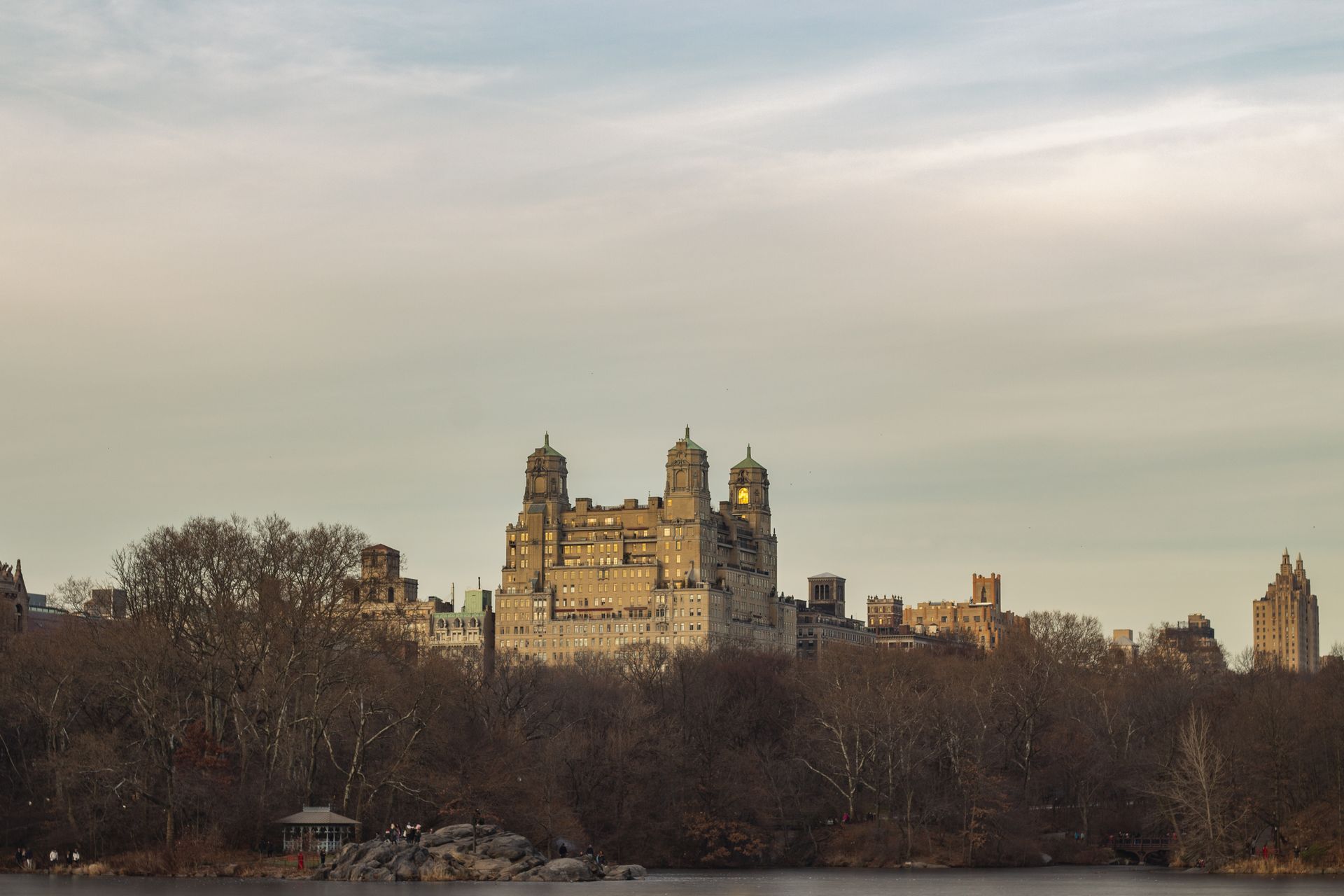Skyline of luxury residential buildings on Manhattan's Upper East Side at dusk.