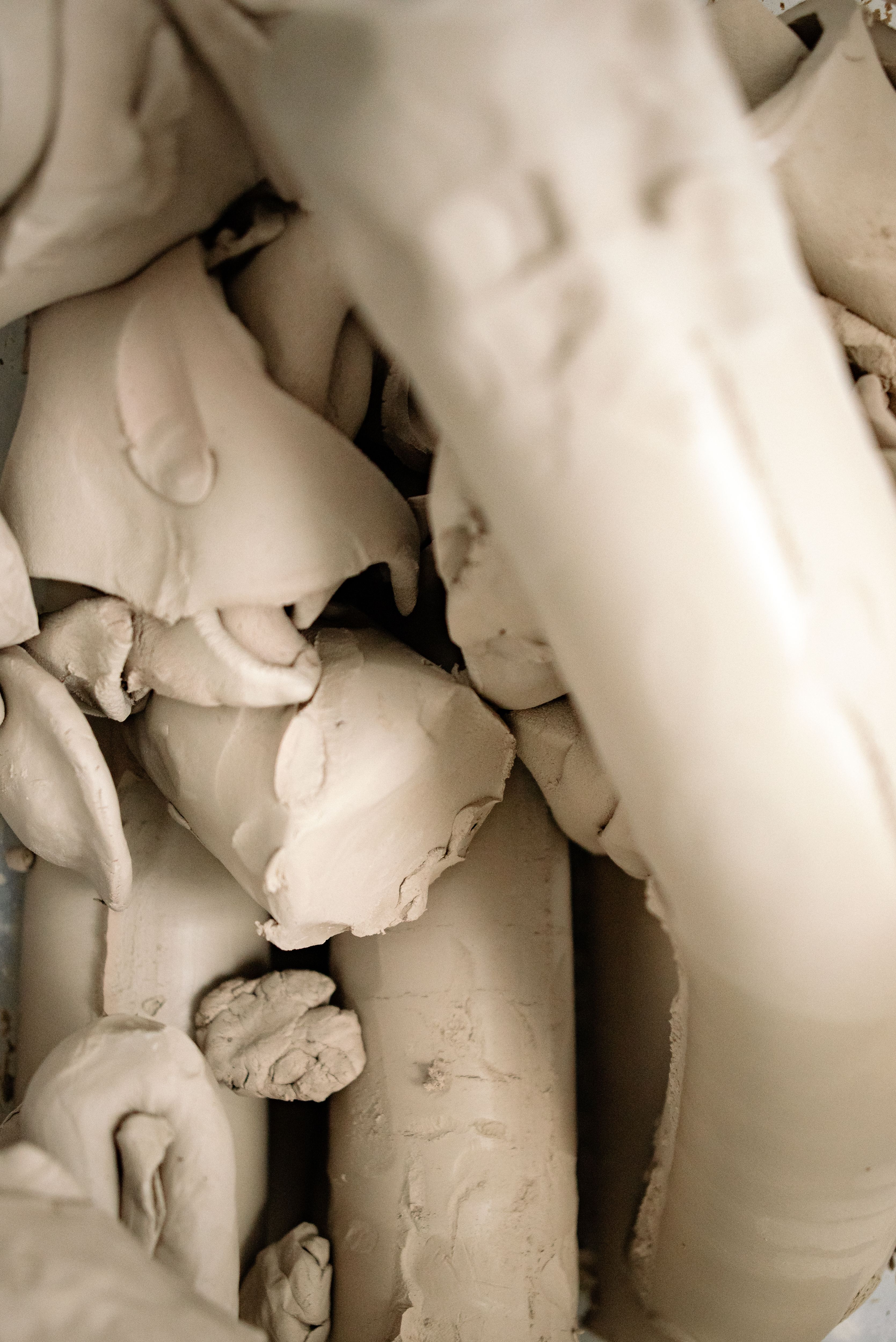Organic close-up of raw clay showing textures and patterns ideal for pottery and ceramics.