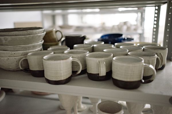 Handmade ceramic pottery on shelf