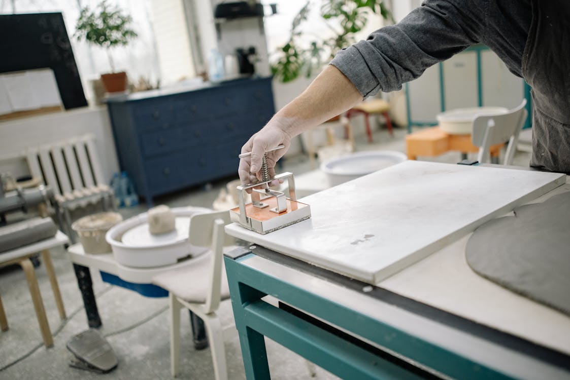 A Person Using a Tool · Free Stock Photo