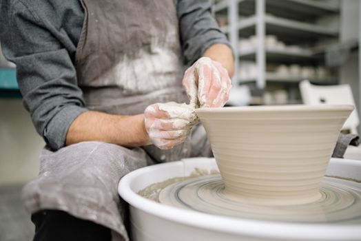 Man Making a Clay Pot 