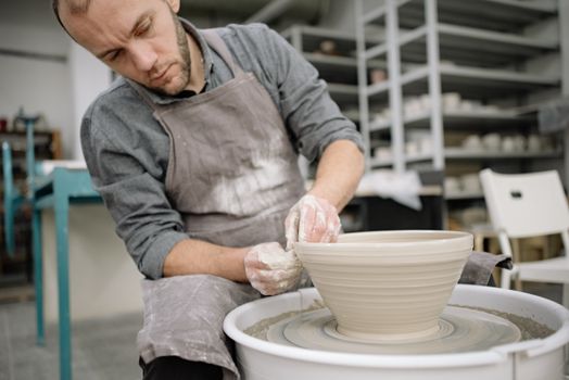 Man Making a Clay Pot 