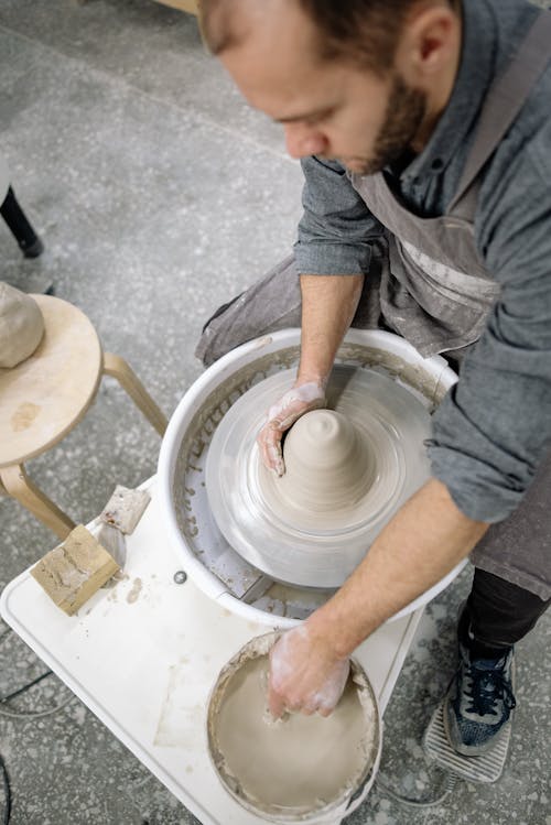 Man Working as Potter