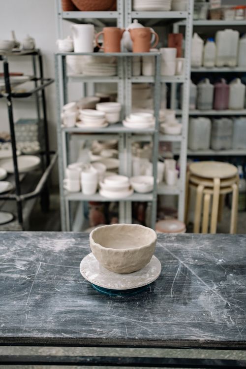 Artisan pottery workshop with a handmade ceramic bowl — photo by Yan Krukau on Pexels