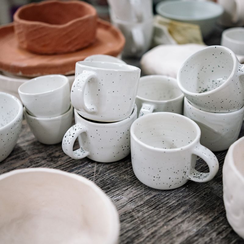 Nested handmade ceramic bowls on a table