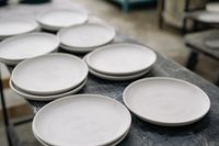 Handcrafted ceramic plates, by Yan Krukau on Pexels