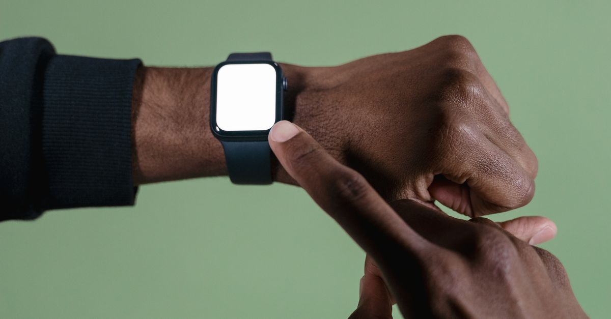 Someone Using A Smart Watch Person Wearing a Smartwatch · Free Stock Photo