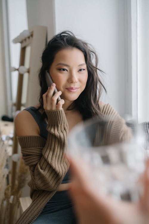 Beautiful Woman talking on Phone
