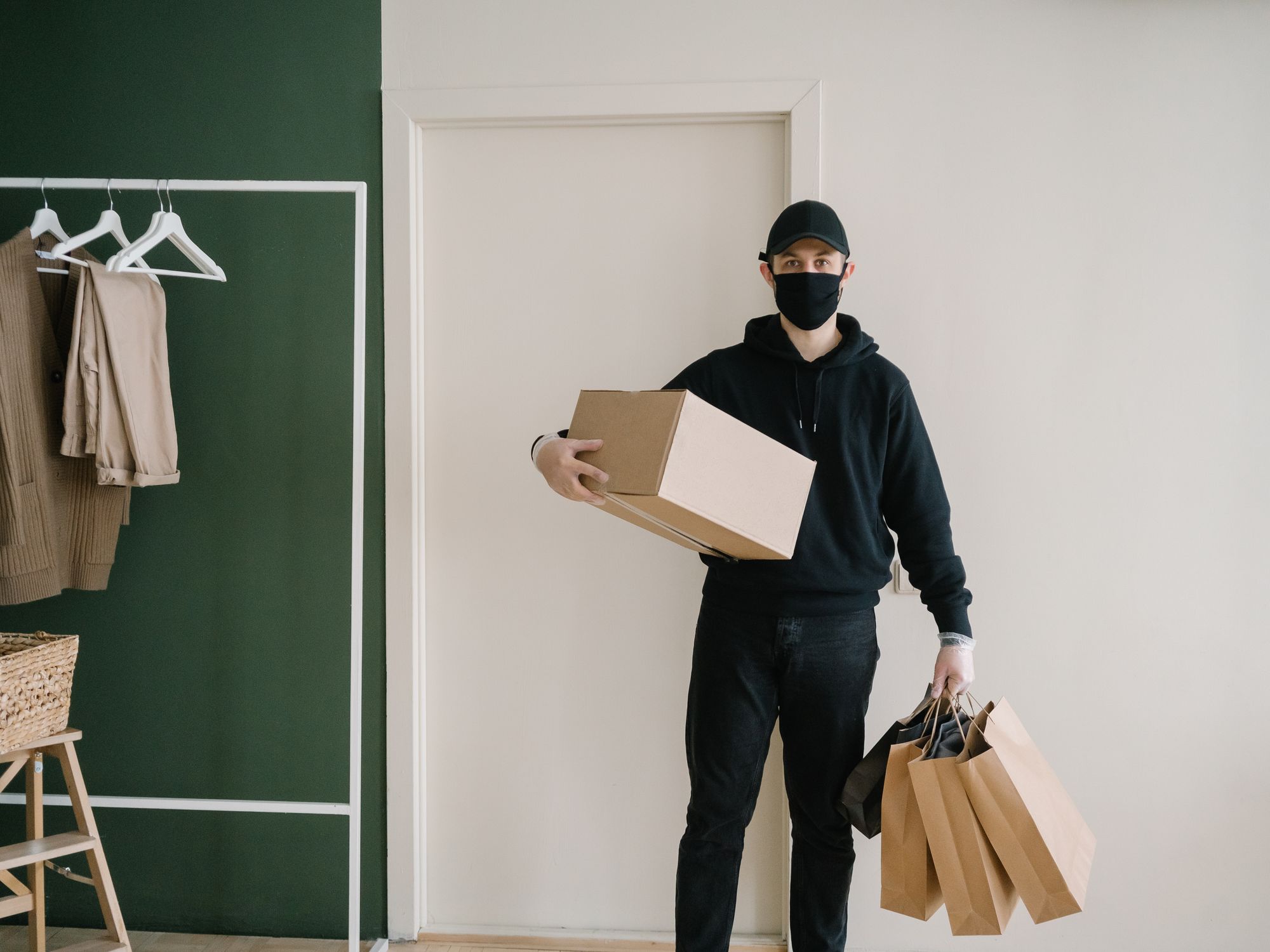 Flat Removals in Henfield, South East — movers carrying boxes for a flat move