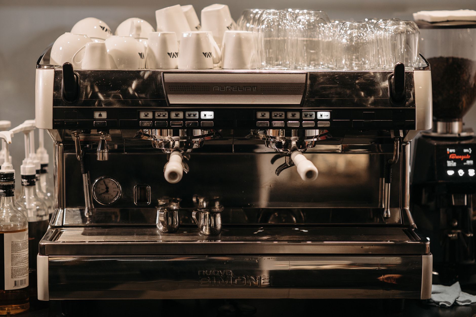 A high-quality espresso machine in a coffee shop setting, perfect for cafe-themed content.
