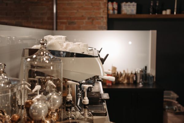 Coffee Cafe for Sale: Smart Guide 2026 1 Coffee cafe for sale - espresso machine behind the bar