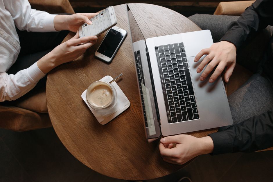 social media content planning laptop coffee