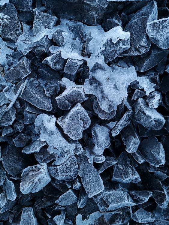 Close-Up Shot of Frozen Stones · Free Stock Photo