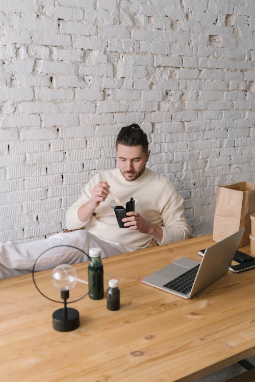 Free A Man Eating a Food Stock Photo