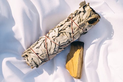 Free Smudging Tools in a White Textile Stock Photo