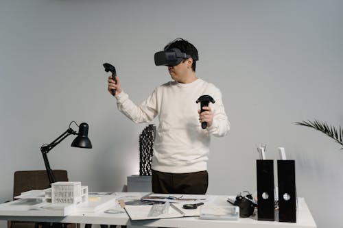 Man Using VR Goggles · Free Stock Photo