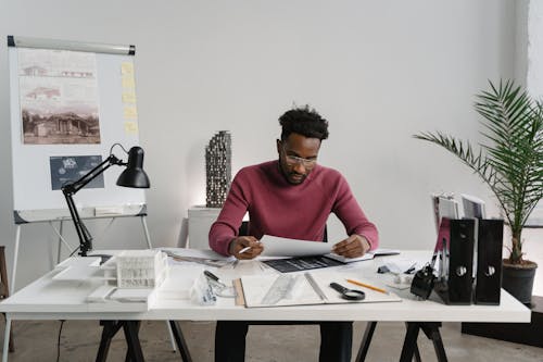 A Man Working Imside an Office