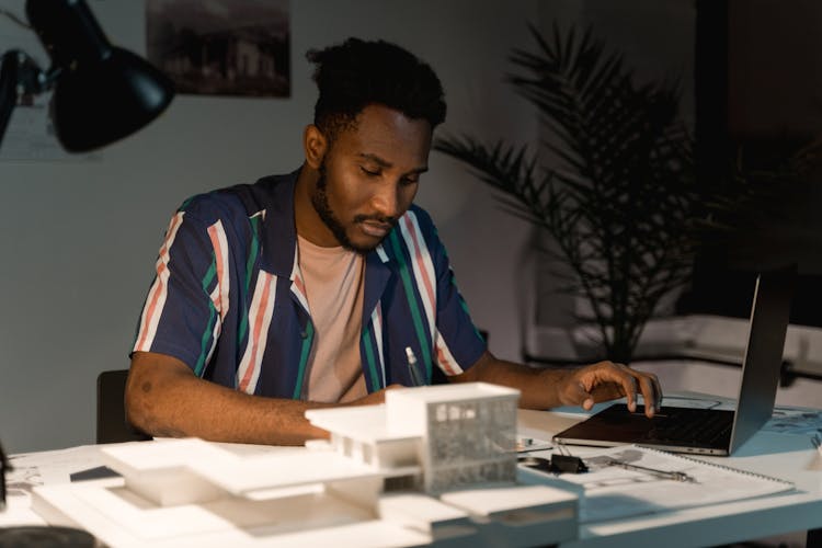 A Man Working In The Office 