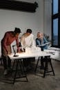 Three People Collaborating on a Project