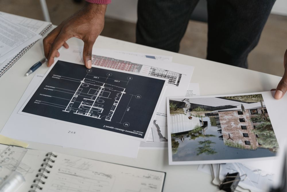 Architect reviewing blueprints