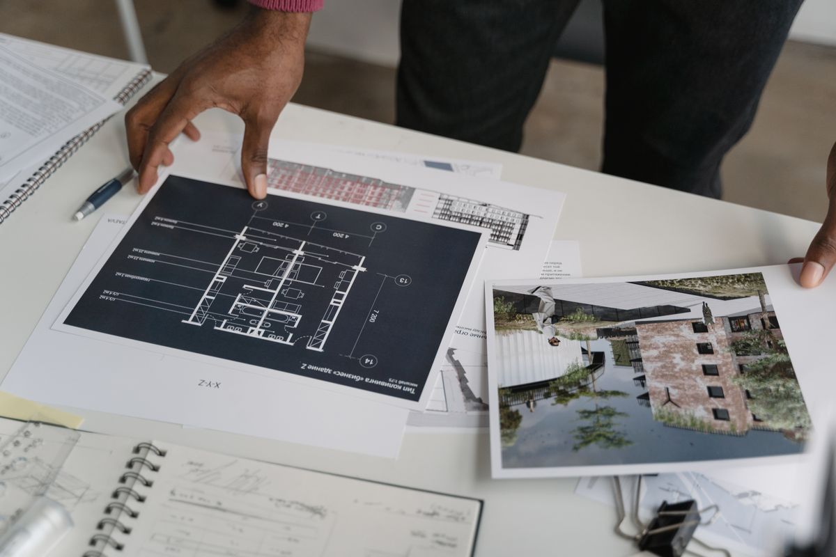 PartNerd team reviewing architectural blueprints