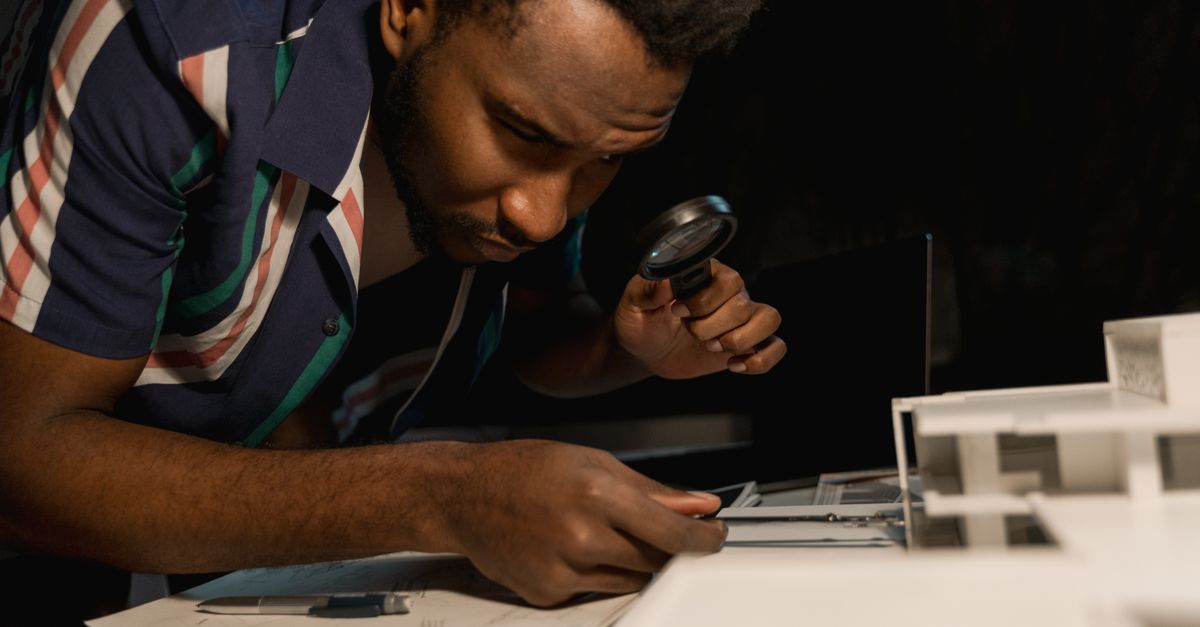 Model Guy Working Man Working on a Miniature Model Building · Free Stock Photo
